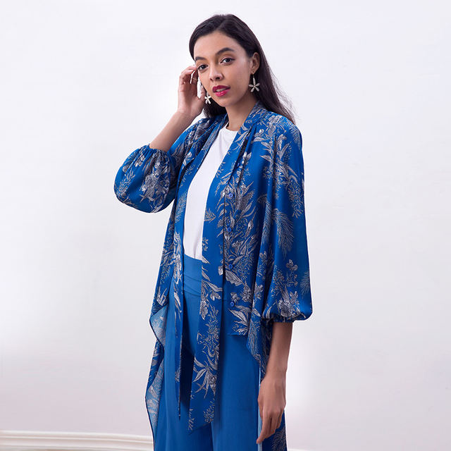 T058 Women Floral print lantern sleeves asymmetric hem neck tie shirt